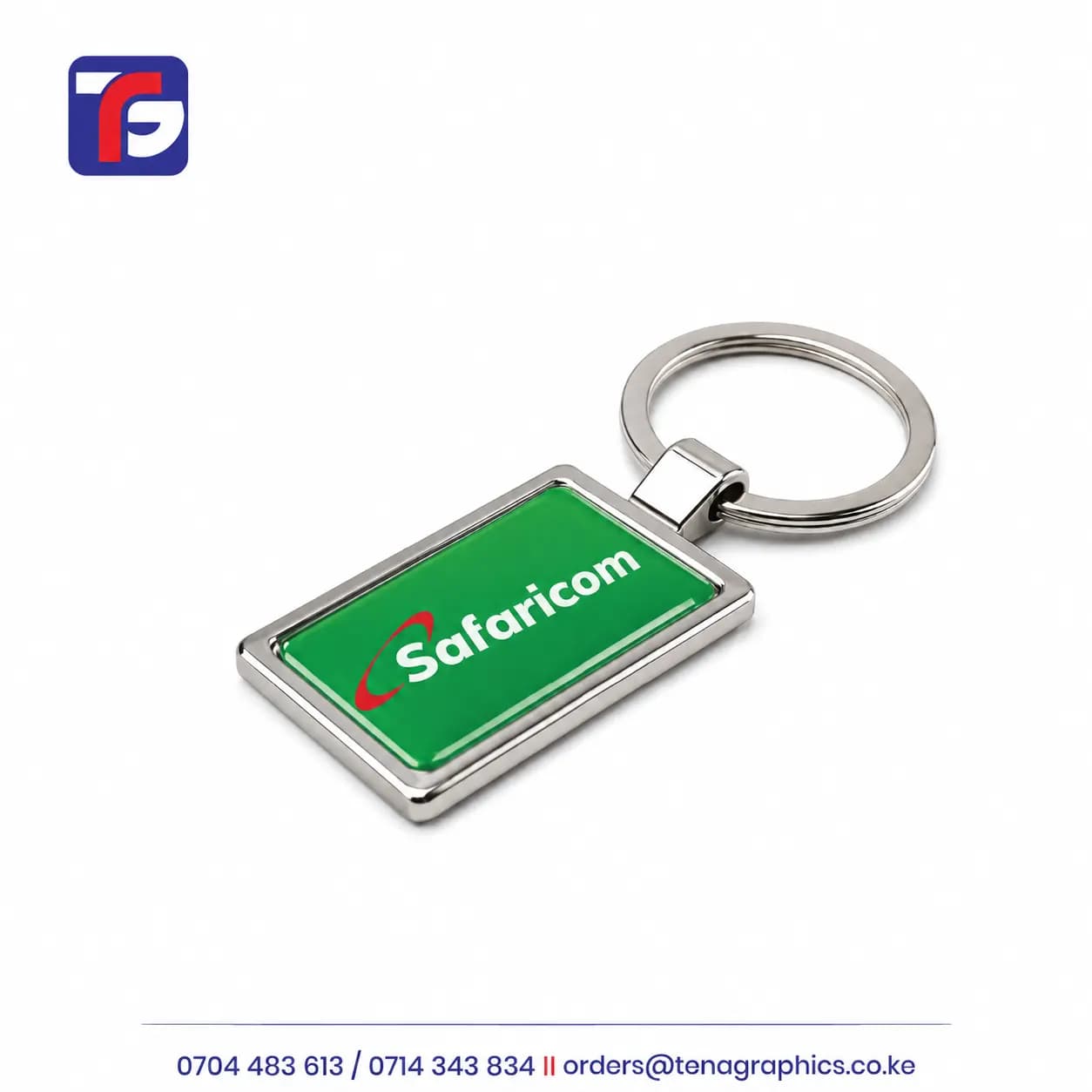 Rectangular branded keyholder with a green Safaricom logo panel, rounded corners, a silver-coloured border and a circular split keyring.