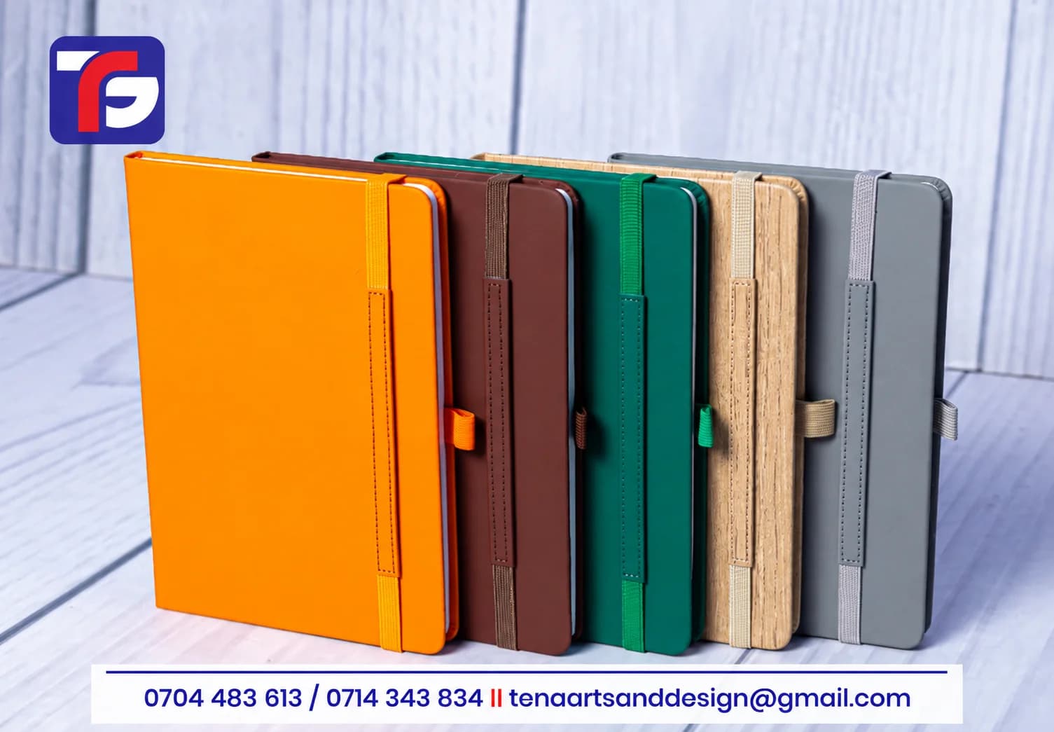 A5 leather hard cover notebooks in orange, brown, green, maple and grey with elastic closure bands and pen slots