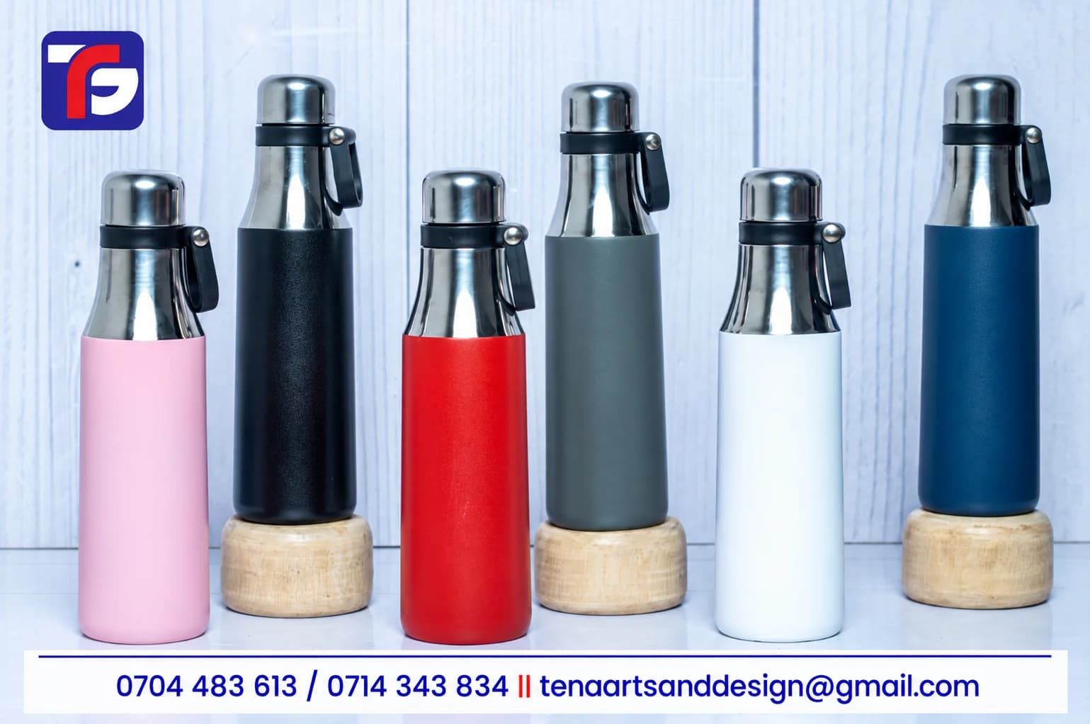 Arrow Steel Flask range in pink, black, red, grey, white and blue with polished metallic necks, caps and black carry loops