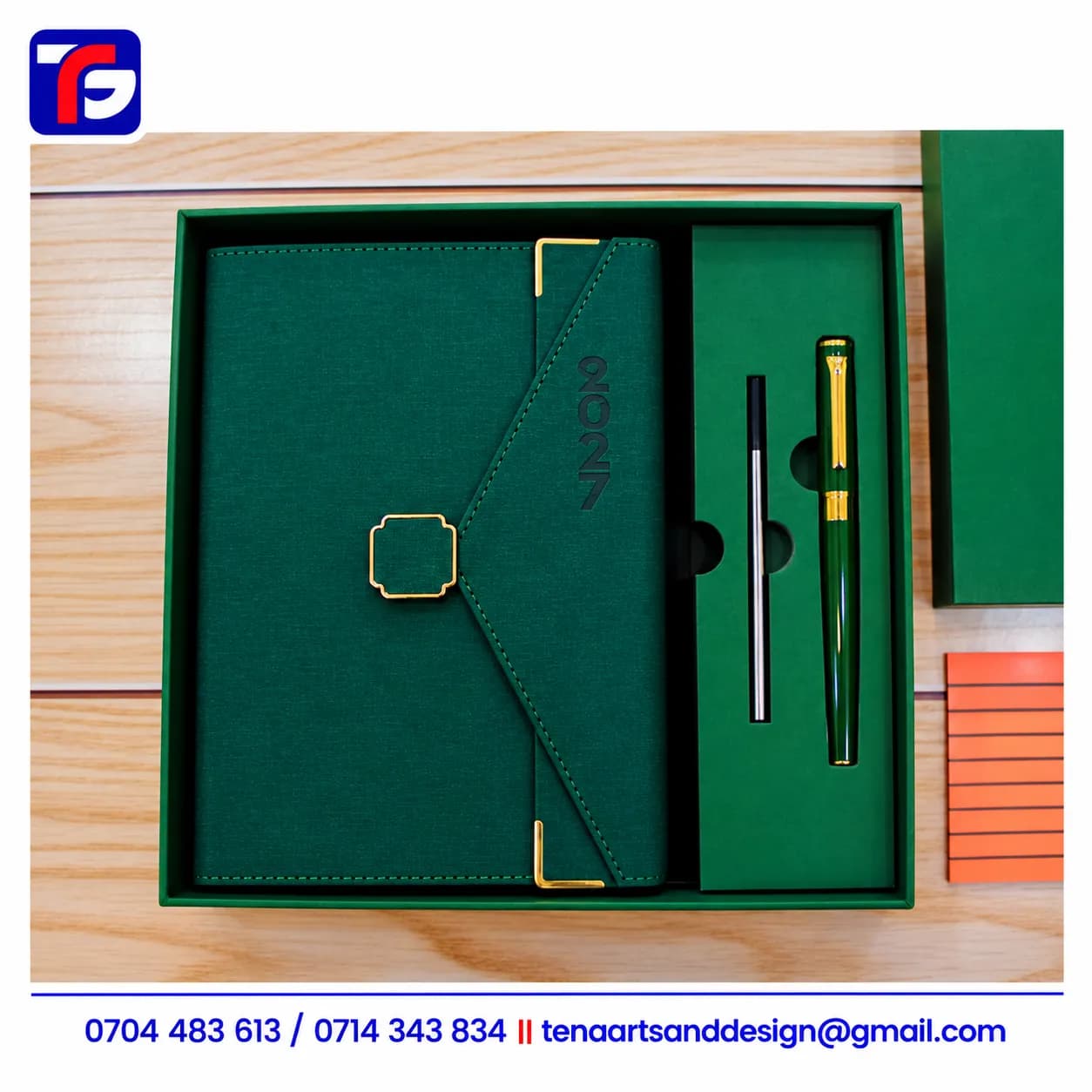 Green 2027 diary gift set with a matching gold-trimmed pen and spare refill in a green presentation box