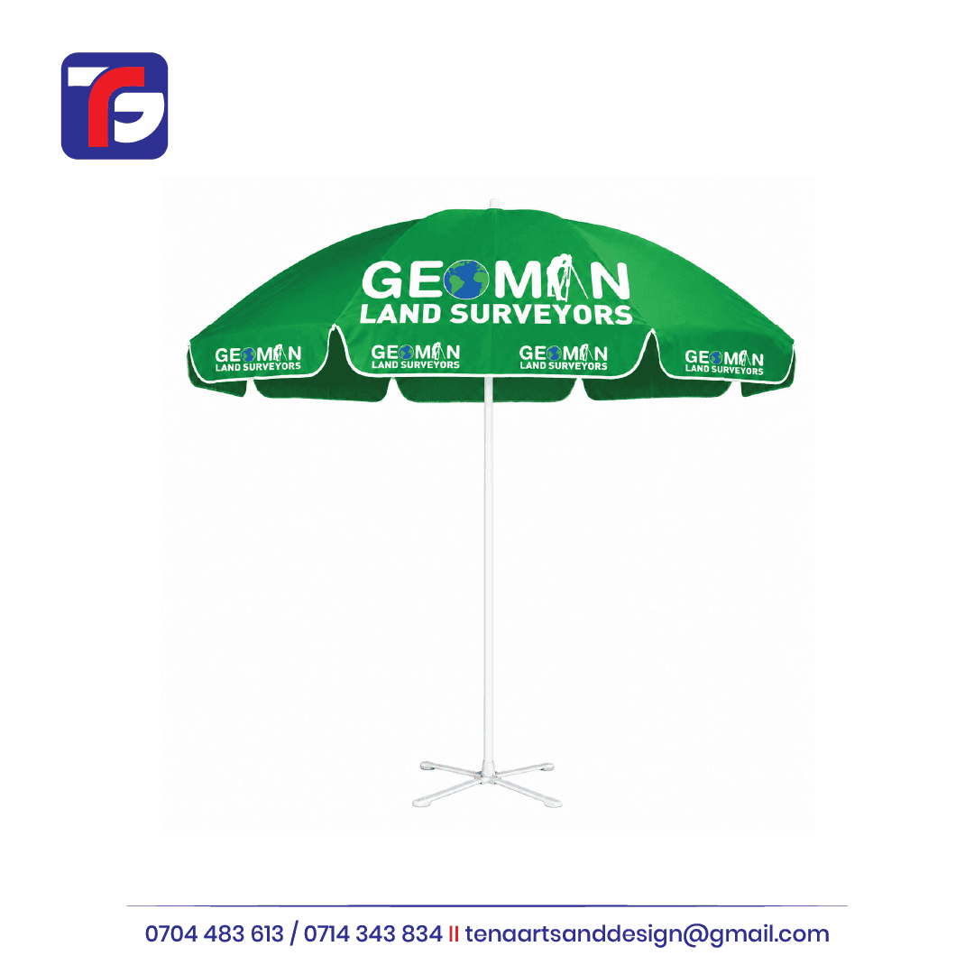 Green parasol with white GEOMAN LAND SURVEYORS branding, globe artwork, white edge trim and a central pole with cross-shaped stand.