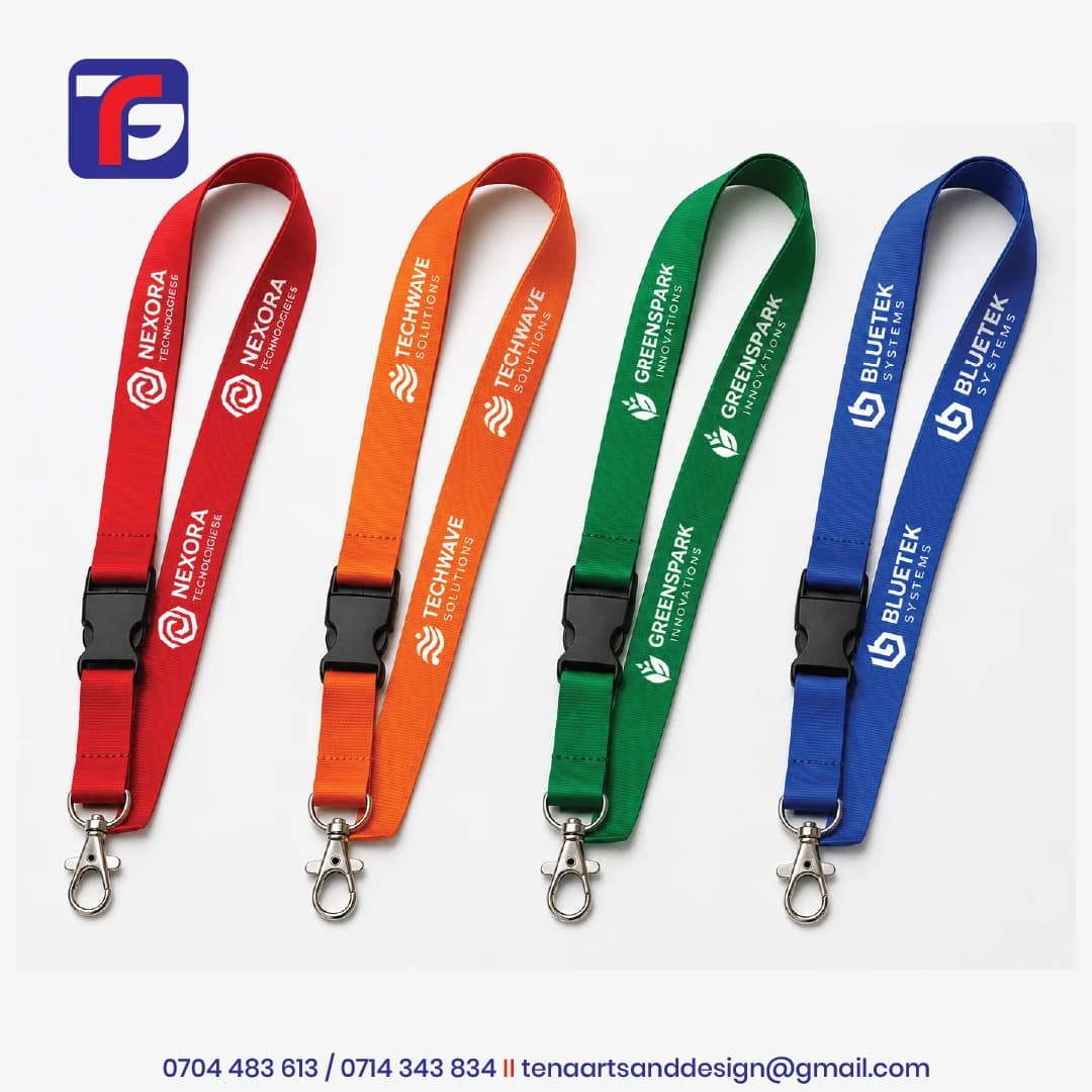 Red, orange, green and blue custom logo lanyards with white company branding, black detachable buckles and silver-toned clips.