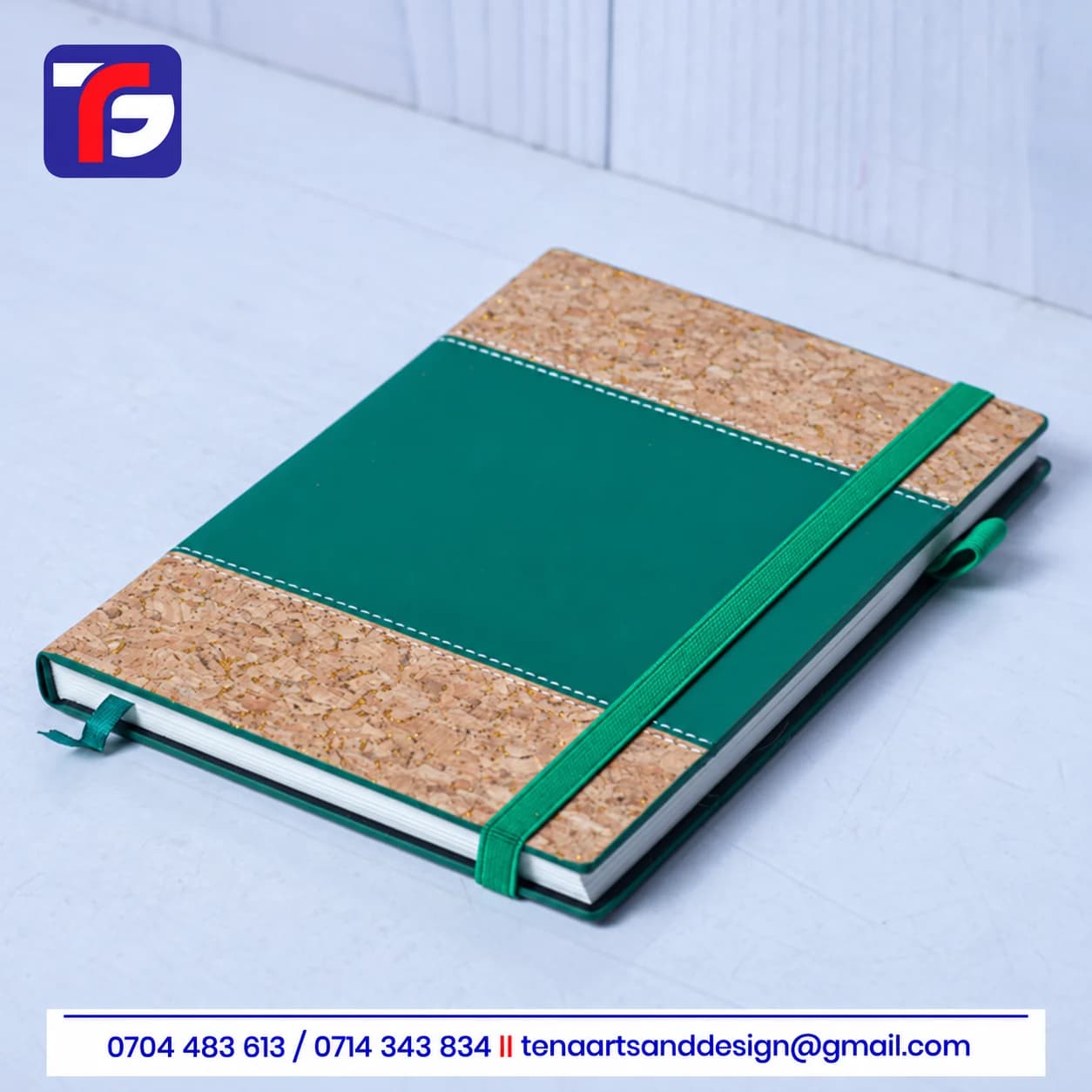 Green double cork executive notebook with natural cork sections, a stitched centre panel, elastic closure band, pen loop and ribbon bookmark