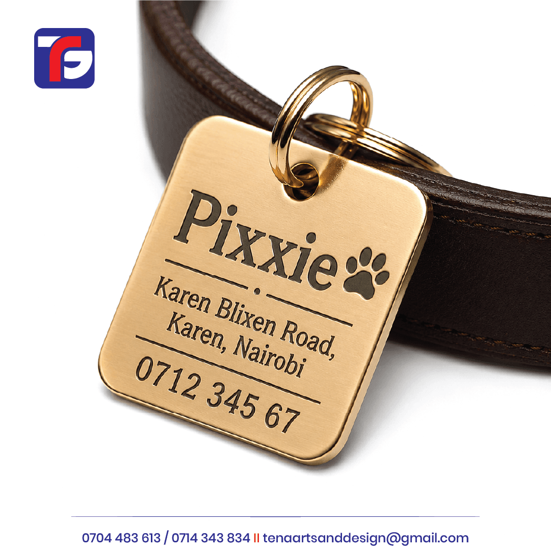 Gold-coloured engraved dog ID tag with Pixxie name, paw symbol, address and contact number attached to a brown collar.