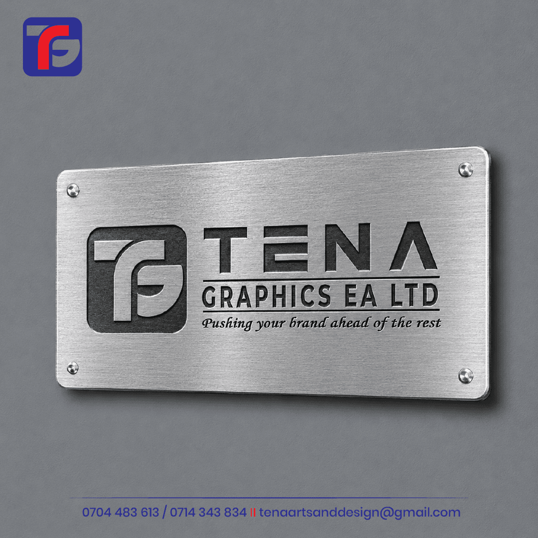 Engraved door signs Kenya design showing a brushed silver Tena Graphics company plaque with dark lettering and four corner fixings.