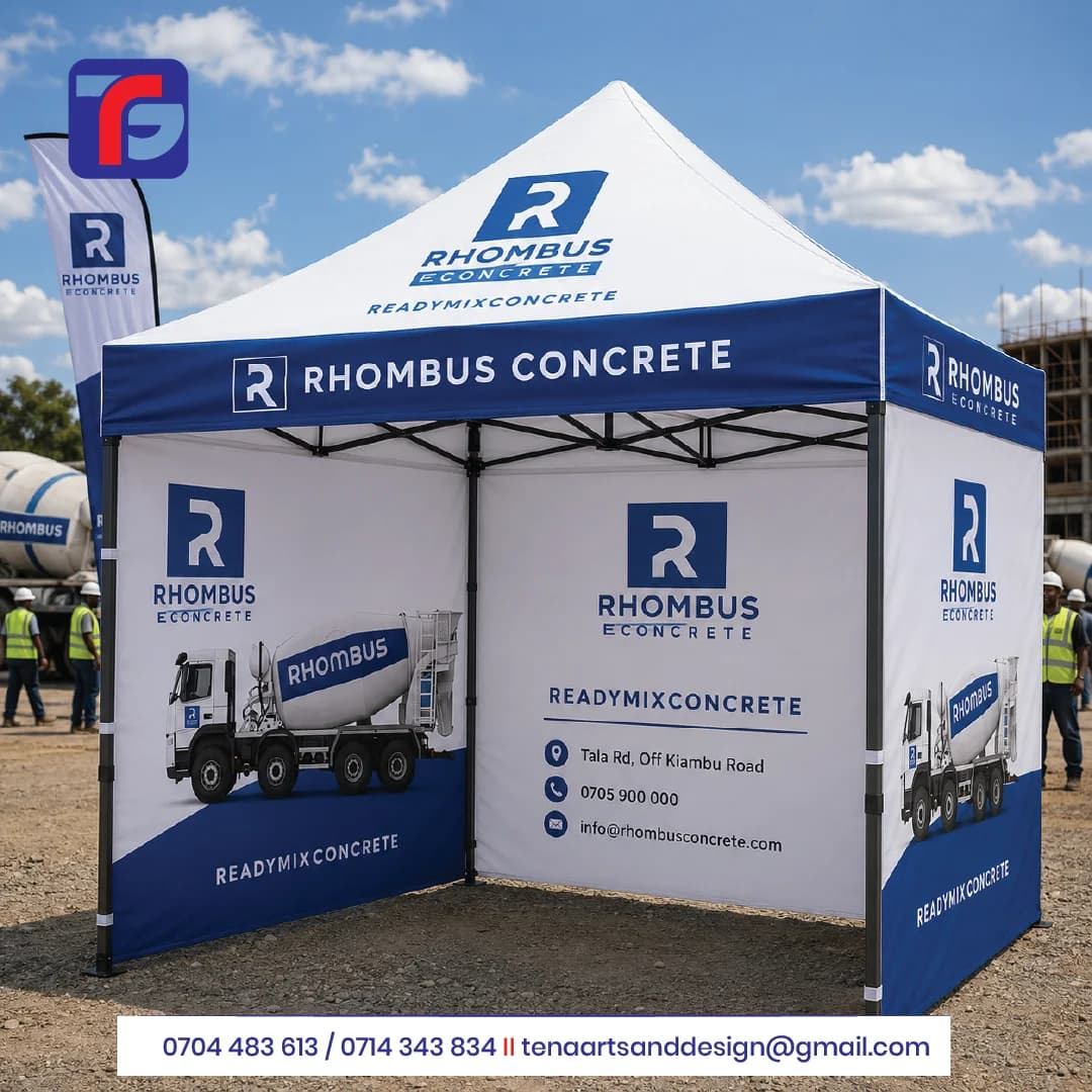 Corporate gazebo branding in blue and white with Rhombus Concrete logos, mixer truck photographs and contact details on printed wall panels.