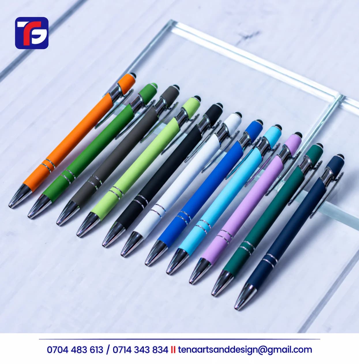 Executive 2-ring rubber pens in assorted colours with silver-tone tips, pocket clips and two rings around the lower barrels