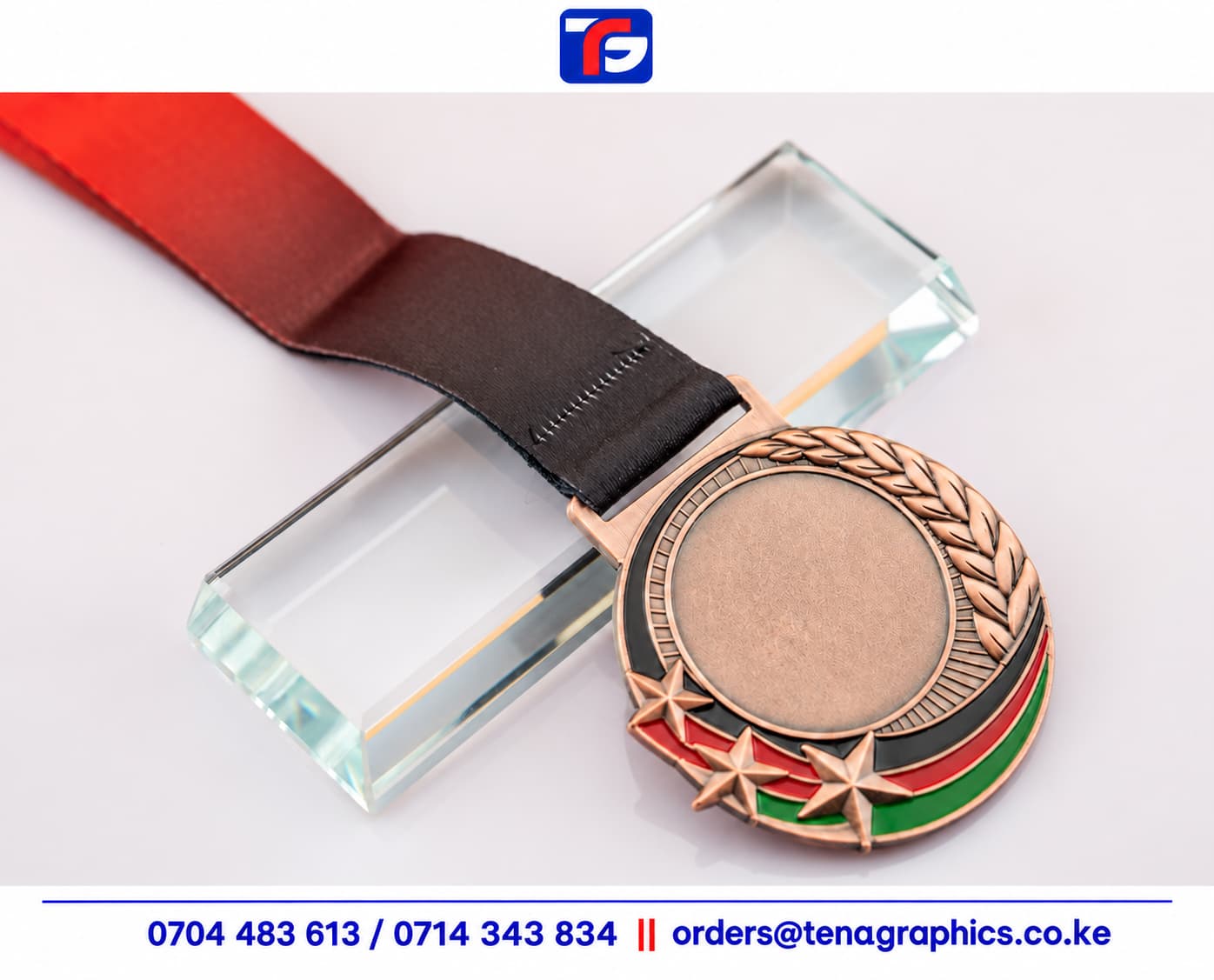 Kenya Colours Three-Star Medal in bronze with a blank centre, laurel border and black, red and green accents.