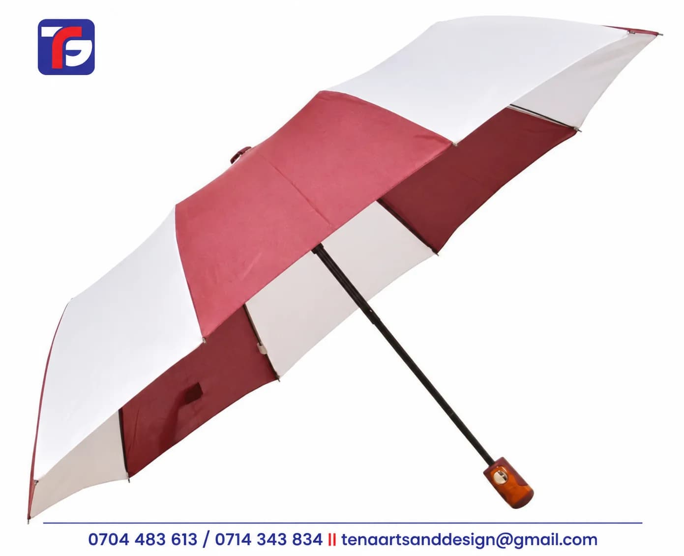 Maroon and white 3 fold umbrella with lining shown open with a black shaft and short decorative handle