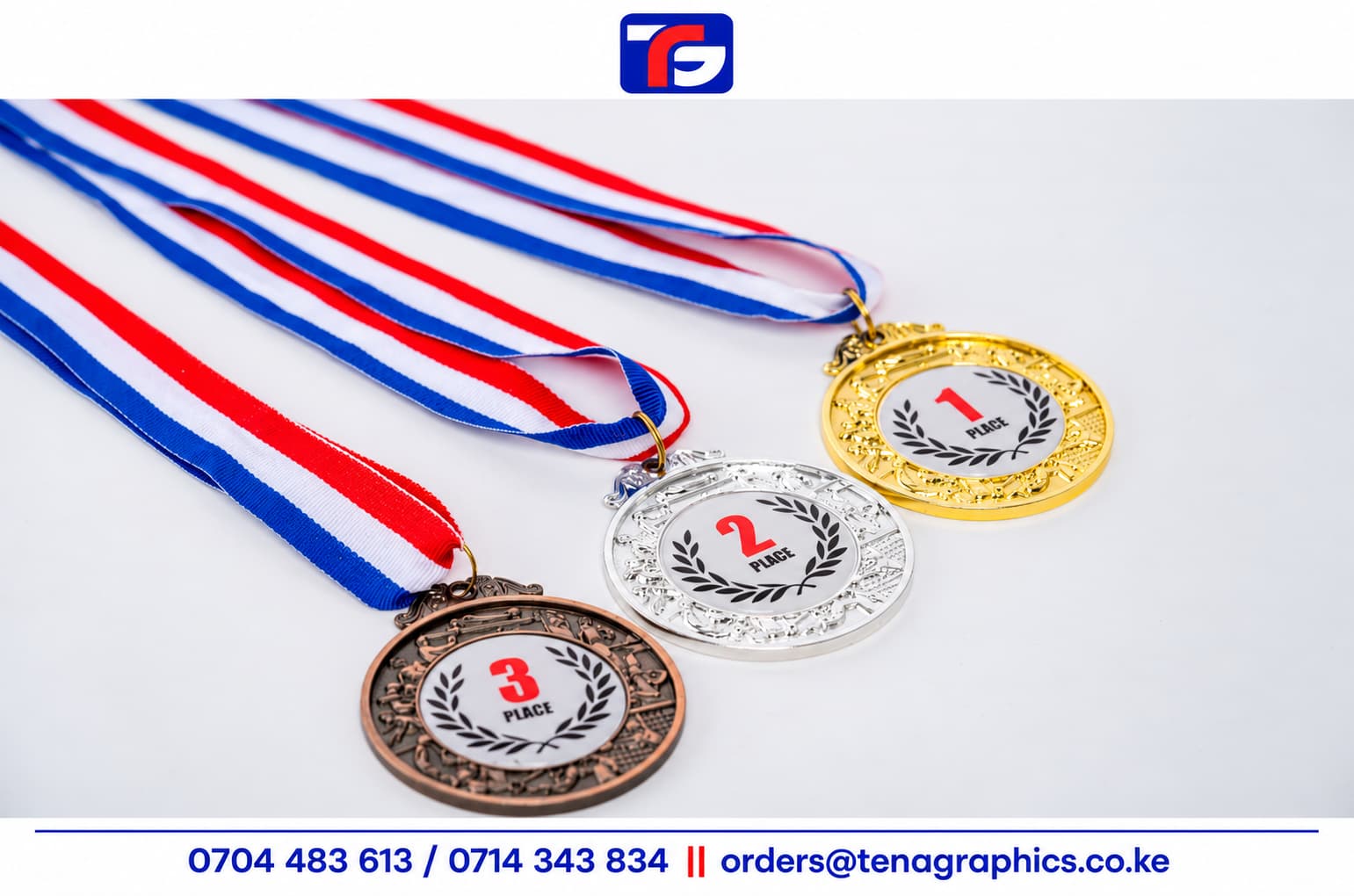 Gold, silver and bronze multi-sport award medals with numbered placement centres and red, white and blue ribbons.